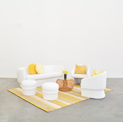 The Soren Sofa, Sven Chair, and Sigrid Stool are available at $400, $175, and $75 per piece, respectively, and come in either a plush white (pictured) or sapphire blue velvet. Taylor Creative Inc.’s team suggests adding vibrant pillows for the ideal mini lounge setup.