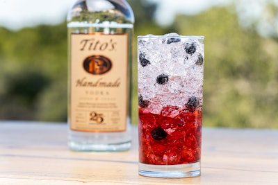 To celebrate the brand’s 25th anniversary, Tito’s Handmade Vodka—an American liquor company based out of Austin, Texas—released four specialty cocktail recipes for fans to sip on. “Tito’s Berry Sparkler” is the perfect selection for MDW for its red, white, and blue color, which comes from a mix of cranberry juice, soda water, and fresh blueberries. Give it a try using the recipe below. Recipe: 1.5 oz. Tito’s Handmade Vodka 3 oz. soda water 2 oz. cranberry juice Garnish: 5 fresh blueberries (For a layered, red-and-white-striped effect, mix the vodka and cranberry juice first, then top off by slowly pouring in the soda water.)