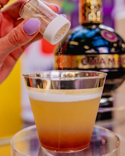 Chambord said “Cheers to all things queer” with an edible glitter-infused cocktail recipe, aka electric dust. The recipe also featured Chambord (of course), Fords Gin, pineapple juice, lemon, and lavender syrup.