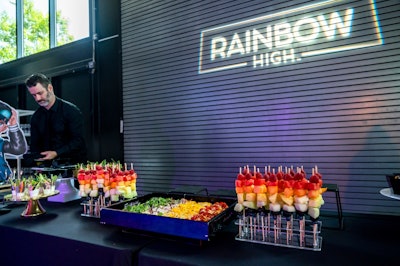 To take the color schemes a step further, 'we worked with our catering partner to create a themed menu focused on each school that included rainbow fruit skewers, rainbow pizza and crudités, sliders with black buns, mac and cheese, and mocktails,' Stoelt said.