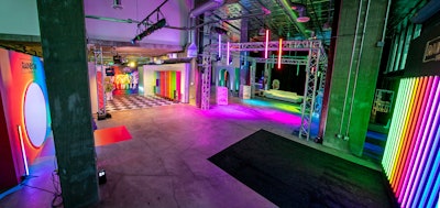 The activation's large footprint was broken into three parts: Rainbow High, Shadow High, and an on-site retail store, with each part featuring unique color schemes, photo moments, and details that evoked the characters from the toy lines and animated series. Producer Matt Stoelt says that despite the size of the space, the biggest challenge was finding ways to fit so many components in one area. “As the design evolved, we quickly consumed almost all of the available footprint with the photo moments, activation, and decor,” he said. To help, the team ended up relocating most of the support space to the loading dock and the second floor of the building. 'Additionally, we were creative with the rigging, placing the main overhead truss in Shadow High on top of the existing steel in the venue, freeing up some additional footprint.'