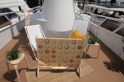 On the top deck was more seating, plus classic table games like Jenga and an oversize BizBash- and Hubilo-branded Connect 4.