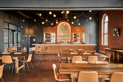 The new IRL event space features a full catering kitchen and a new bar space, allowing the distillery to be used for pairing dinners, private gatherings, cocktail classes, meetings, and corporate events. It holds 120 reception-style and 72 seated.