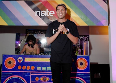 The tech company’s founder, Albert Saniger (pictured), took a moment to speak on what Pride means to him as a member of the LGBTQIA+ community. Daphne Ciccarelle, an experiential brand marketing associate at nate, said the celebration inspired a “sense of community from the moment [guests] walked into the building.” As far as decor, Ciccarelle said that “along with nate’s Pride campaign branding, rainbows were apparent throughout the space,” as well as “feather boas, colorful beats, and an endless supply of nate-branded condoms.” Soundhouse Rentals handled lighting, the playfully branded decor was courtesy of Club Colors, and DJ Lauren Kleiman spun tracks.