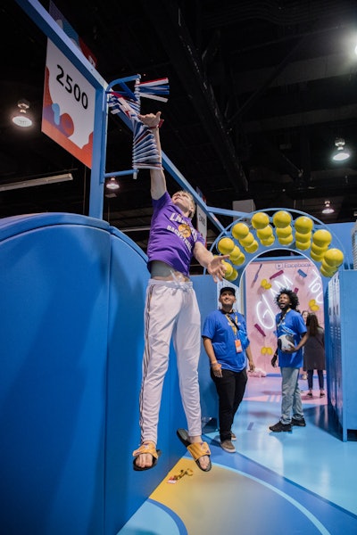 In another photo-friendly room inside Facebook's VidCon booth, guests tried to beat Steph Curry in a virtual basketball game and challenged friends to a jump contest. A third space, called the “chill room,” had a hot tub and a confessional video booth. See more: How VidCon Attracts 'the Most Media-Savvy Audience in the World'