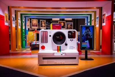 At C.E.S. 2019, Polaroid gave guests the chance to experience the then-new Polaroid OneStep analog instant camera from Polaroid Originals. With an oversize replica of the camera as a centerpiece, the booth featured interactive stations that showcased the product’s features such as double exposure, light painting, and noise trigger. Attendees could have their picture taken on color or black-and-white Polaroid Originals film and experience film photography techniques like emulsion lifts. Polaroids were displayed on branded walls. Andreas Bergmann designed the colorful booth, while Skyline handled the build and PRG handled audiovisual elements. See more: C.E.S. 2019: 17 Buzzy Highlights From the Show Floor and Other Activations