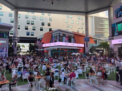 Attendees enjoy the opening night reception at Distrito T-Mobile, a brand-new entertainment district on the island, located just steps away from the Puerto Rico Convention Center.