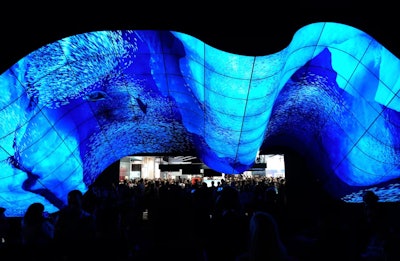 For the 2020 edition of the Consumer Technology Association's annual C.E.S. trade show, LG created a mesmerizing audiovisual 'wave' for its booth. Constructed using 200 55-inch LG OLED digital signage screens, the dramatic overhead installation “displayed the glory of the natural world as it has never been seen before,” according to the brand. Ever-changing nature-inspired images and sounds created a surreal, immersive experience for guests. See more: C.E.S. 2020: See the Most Attention-Grabbing Booths and Brand Activations