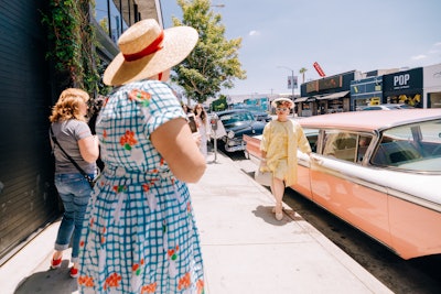 Guests were encouraged to don their best Maisel-inspired outfits, and could pose for photos with classic cars before entering the activation.