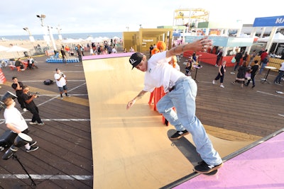 To add to the boardwalk feel at the Amex and Resy event, professional skateboarders skated on a branded half-pipe.