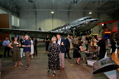 To celebrate the launch of its new credit card design, American Express and Delta Air Lines hosted a seated dinner on a 747 plane at the Delta Flight Museum in Atlanta.