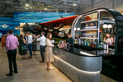 The bar setup featured a sleek, aviation-inspired design.