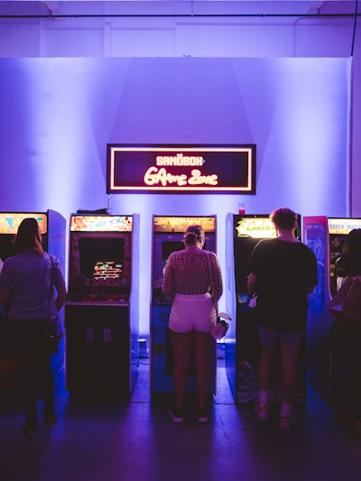 A retro arcade gaming area kept guests engaged.
