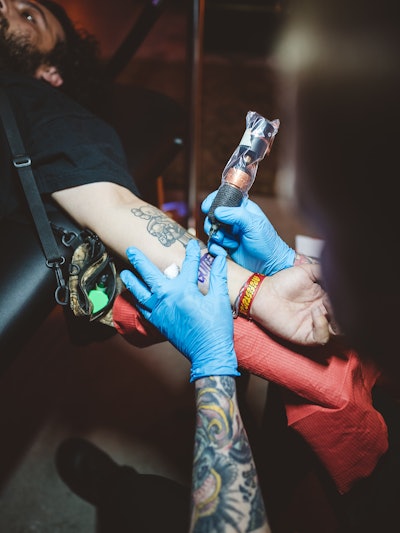 Another memorable touch? At an on-site tattoo parlor dubbed Ratt’s Tatts, “guests could receive custom or pre-designed Gutter tattoos,” MacIntyre said. He also attributed the unforgettable party favor to the “universally positive feedback,” as it “helped deliver an above-expectation experience for this special community.”
