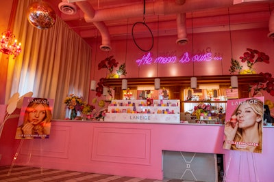 The Moon’s on-site bar was transformed into a makeup counter, and the display showcased Laneige’s face and lip care products. The counter was flanked with bouquets and posters of the brand’s newest campaign featuring actress Sydney Sweeney.
