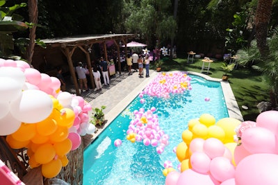 Confetti & Sprinkles surrounded the outdoor area in balloons and beach balls with F21 X Barbie’s co-branded logo filled the pool, which Glick said “really created a vibe to kick off summer.”