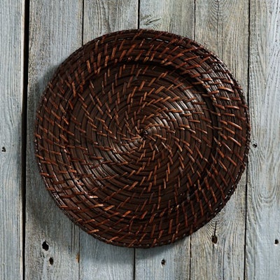 Rattan round charger ($6.20 each), available in the mid-Atlantic region and parts of New England from Party Rental Ltd.