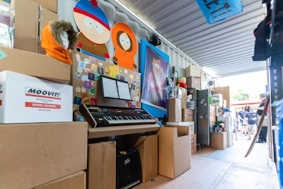 Boxes, tubs, and cabinets line the walls, and interactive elements include a keyboard for guests to play from South Park sheet music. Exclusive South Park merchandise is also available for purchase on-site. The activation’s tour kicked off in New York on July 23 and is traveling to Chicago, Colorado's Red Rocks Amphitheater, Denver, and Los Angeles over the next month. During the tour stop at Red Rocks from Aug. 9-10, the team will commemorate South Park's landmark anniversary with a two-day concert headlined by creators Trey Parker and Matt Stone, as well as musical acts Primus and Ween. There will also be a nearby tailgate with lawn games, stage programming, themed food and beverages, and photo moments. “There are few television series as long-running and infinitely outrageous as South Park,” says Leighann Farrelly, director of business leadership at Superfly. “At Superfly, there is nothing we love more than giving fans access to the music, TV, and films they love most. This was a fun way to pay homage to the show on its 25th anniversary and take a walk down memory lane with some of the biggest moments in South Park history.”