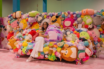 The Jazwares activation also featured a couch made of Squishmallows and other fun photo moments, along with a 15-foot-tall Squishmallows tower and mini claw machines for bonus challenges.