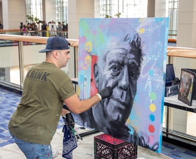 RJ Whyte Event Production once again partnered with D.C.-based artists No Kings Collective to create a custom painting on-site during the event. Whyte said the collective suggested they create a portrait of renowned chef Anthony Bourdain, who passed away in 2018. The painting was auctioned off later that evening, with proceeds going toward the RAMW and its education programs. 'That was one of the bigger items of the night, in terms of somebody winning it,' Whyte explained. 'It was amazing to partner with No Kings again; they do a lot of mural art around town. They also partner with a lot of local restaurants to do murals either inside their space or outside on the building.'