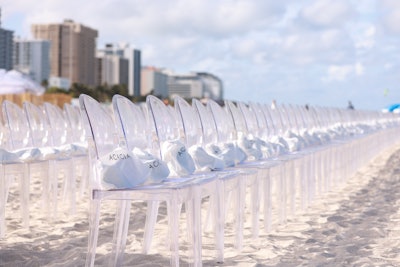The setting was dreamy. Hundreds of acrylic chairs took over a corner of South Beach and welcomed guests with a favor courtesy of ACACIA on each seat.