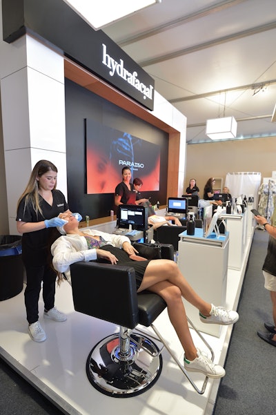 Inside, Hydrafacial pampered guests in a pop-up salon. LD2 Productions was behind the LED screens and video management.