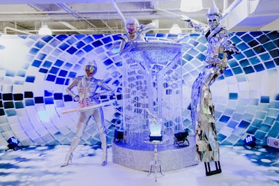 At the BizBash trade show in July 2018, event entertainment company Champagne Creative Group created a futuristic mirror-themed booth on the exhibition floor, featuring a man made of mirrors and a woman posing with a martini glass. Various characters were exhibited.See more: BizBash Live: 14 notable event ideas and products in Los Angeles