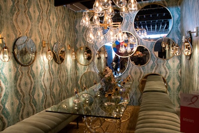 At the March 2016 edition of Diffa Dining by Design New York, Arteriors' tablescape was inspired by the lost city of Atlantis. It featured agatelike wallpaper, which mimics undulating waves, along with lush tufted-velvet benches, gold accents, and a variety of circular mirrors and other reflective surfaces. The annual fundraiser features top designers, brands, and local talent showcasing their creative and inventive work; proceeds from the event go toward AIDS research and education. See more: 26 Ways to Refresh Seated Dinners