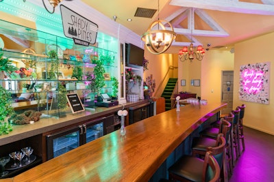 The Shady Pines bar features a custom cocktail list.