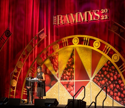 The ruby motif also came into play in the stage design. The gold geometric backdrop was a play on the deconstructed lines of a cut gemstone. 'The main stage was, I think, our most beautiful awards main stage of the past 10 years,' said Roger Whyte, CEO and founder of RJ Whyte Event Production, the production company behind the event. 'Each year it's always been unique and amazing, but this year really just took your breath away a little bit when you walked in.'