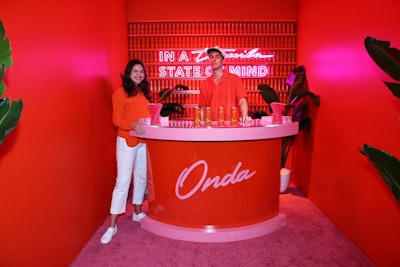 There were also mini bars and activations throughout the space courtesy of REVOLVE partners. Take the red-washed room that brought Shay Mitchell’s Onda Tequila Seltzer can to life, for example. Other beverage partners in attendance included LaCroix, Celsius, and 818 Tequila.