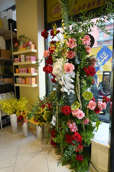 Inside, a floral mural designed by Latina-owned floral design studio Flower Bodega welcomed guests into the space. Also on display—UPS and Awake’s limited-edition “Unidos Para Siempre“ (United Forever) collection, as well as other designer apparel, goods, and products by small businesses.