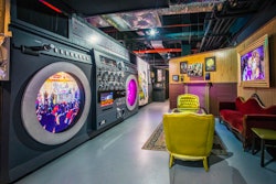 The giant boombox replica sits inside the exhibit's Dapper Dan Lounge vignette.