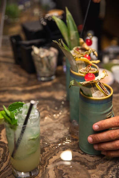 A favorite signature cocktail among guests was the 'Rum Away with Me,' a tropical pour made of Flor de Caña rum, Disaronno, Thai iced tea, pineapple juice, cinnamon, coconut cream, and lemon juice. It was served in a tiki glass and set aflame upon serving.