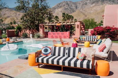Stripes can also make a major design impact when used minimally, like at Instagram's inaugural Coachella party in 2019. The social media platform teamed up with experiential agency Manifold and artist D'ana Nunez of COVL for Instagram Desert Chill. The look of the party centered around Nunez's abstract mural, which drew inspiration from the desert landscape and the 1970s. Manifold created a series of black-and-white striped lounge seating areas, offset by colorful pillows, props, and a photo-friendly neon palm garden. Coachella 2019: See Inside the Biggest Parties and Brand Activations