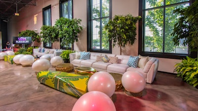Another wellness-focused seating idea comes from a 2017 networking event from Chicago-based Kehoe Designs. The company created a fitness-focused gathering for its employees that included a workout from Barry's Bootcamp trainers. Decor was a playful-but-stylish take on a fitness theme, with details like orchids anchored to kettlebells as centerpieces, while balance balls set in gilded stands made for unexpected and inventive side chairs. The chairs were custom-fabricated by the Kehoe Designs team. See more: See a Workout That Turned Into a Networking Event