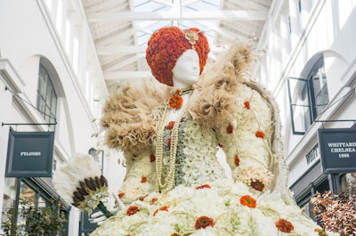 Vancouver-based floral experiential company Fleurs de Villes debuted “FEMMES” earlier this year—a pop-up series dedicated to female trailblazers and harbingers of change throughout history. On the list, England's first Queen Elizabeth as she appeared in the painting The Ditchley Portrait. The larger-than-life, flower-garbed mannequin was crafted by “fleur”ist Amie Bone. See more: Snag Some Floral Inspiration From This Women's-Empowerment Pop-Up Exhibition