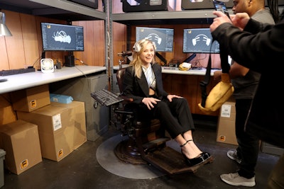 In a back room, attendees were invited to sit in a chair and try on the headset, a nod to the main character’s journey in the show. The experience triggered glitching on nearby screens, followed by a voiceover that sent the group into another room. The cast, including Moretz (pictured), stopped by the experience during the con.