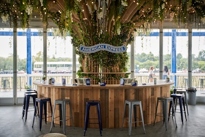 The second level of AmEx's main ground lounge was open to card members. There was an indoor space with air-conditioning, lounge-style seating, phone-charging stations in the shape of tambourines, and a patio offering spot-on views of the headlining stage.