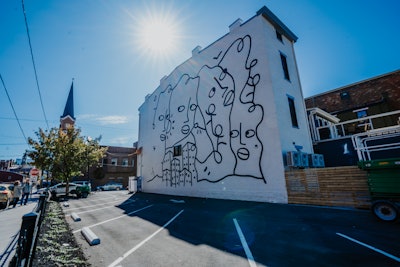 Known for her large-scale, black-and-white line drawings, Shantell Martin used a similar design for her BLINK piece, Danke, which means “thank you” in German. She described Danke as an homage to Cincinnati’s German heritage.