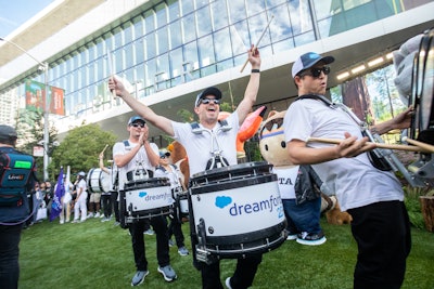 An all-new homecoming celebration celebrated a successful first day. Surprise-and-delight moments included a 15-piece marching band, a seven-piece brass band, an eight-piece drum line (pictured), and nine color guard performers—all provided by BDEntertainment (BDE)—parading down Howard Street.