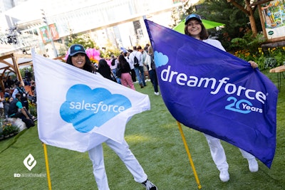 Color guard performers rocked all-white jumpsuits and brandished seven different custom-designed flags with the Dreamforce and Salesforce logos, as well as five flags highlighting Salesforce’s 'Earth Values:' sustainability, trust, innovation, equality, and customer success.