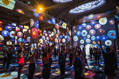 The classes take place every Thursday morning through Oct. 27 in the historic Emigrant Industrial Savings Bank at 49 Chambers St. Like the Equinox series, Hall des Lumieres can be booked for private events with custom projections including branded moments or a fully custom exhibit with bespoke visuals and music for an additional fee. A team of creators and technicians is available to help with the design, implementation, and management of the custom projection. The current Klimt exhibition, which runs for approximately one hour, can also run on a loop during private events.