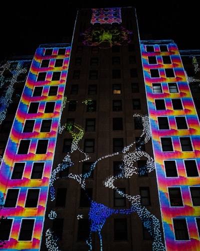 To the Moon by Sean Van Praag was projected onto the American Building in the Over-the-Rhine district of Cincinnati.