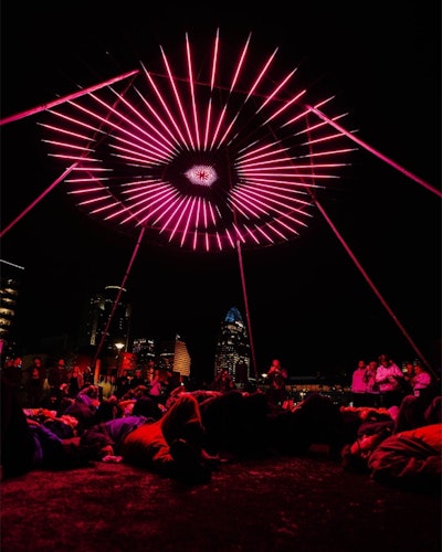 “Parastella” was a 20-foot diameter disc of LEDs in a radial pattern. As classical music played during the fest, patterns chosen for each section of each musical piece appeared on the LEDs.