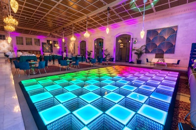 “We referenced a lot of the Gilded Age and art deco details of the 1920s, but wanted to really bring it into 2022,' Gurley explained. To do so, the team incorporated fun, tech-forward components like an LED dance floor for the after-party.