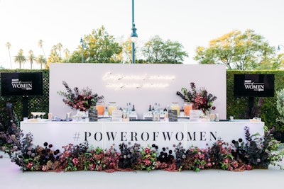 The event was held at the Wallis Annenberg Center for Performing Arts in Beverly Hills. Florals were designed by Moon Canyon.