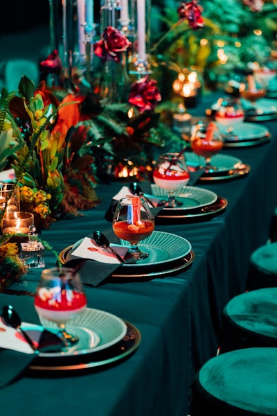 In May, Australian event planning company Event Society invited 150 local and international event profs to the Gold Coast Convention and Exhibition Centre (GCCEC) to show off the venue's opulent Emerald Room. The tablescape leaned into the room's namesake color, with emerald linens and flatware, crystal glassware, and over-the-top arrangements of live greenery and lush roses. See more: Trend Spotted: How Companies Are Enticing Attendees Through Memorable Foodie Experiences