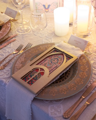 Stained glass-inspired stationery and table numbers by TPD Design House adorned the table settings. 'We could not have naked candles in the cathedral, which is unusual for us in Ireland where we are normally permitted naked flame in most locations,' Fay explained.