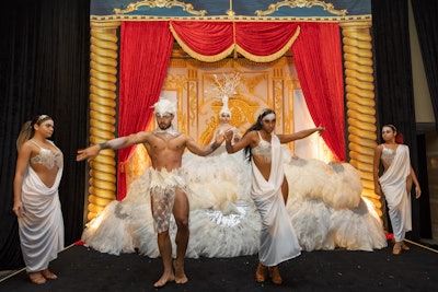 A performance featuring a large white peacock and crystal-clad dancers set the tone for the night’s creative spirit.